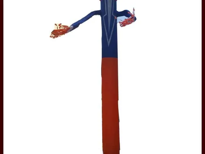 Studio product shot of a Halloween inflatable air dancer with pumpkin head against a plain white background